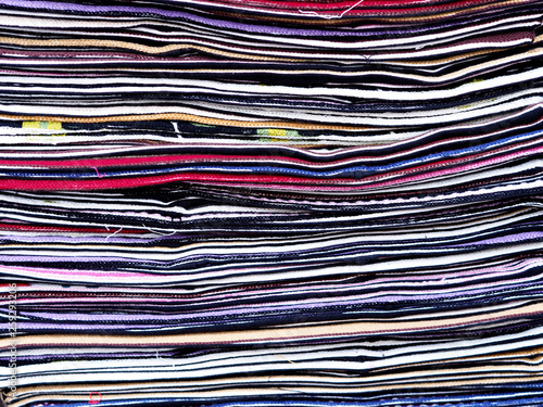 Colorful fabrics row . Colorful fabrics stack.