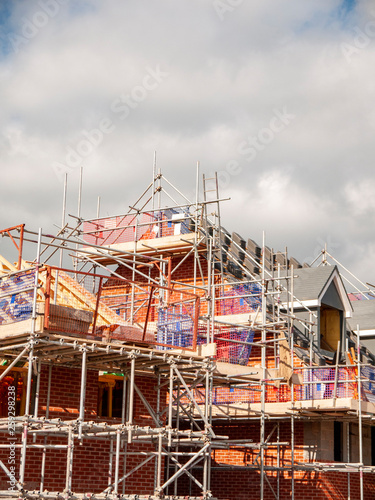 New build houses with roof detail on building site in Cheshire UK