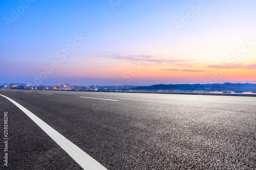 Asphalt highway passing through the city above in Hangzhou at sunset © ABCDstock