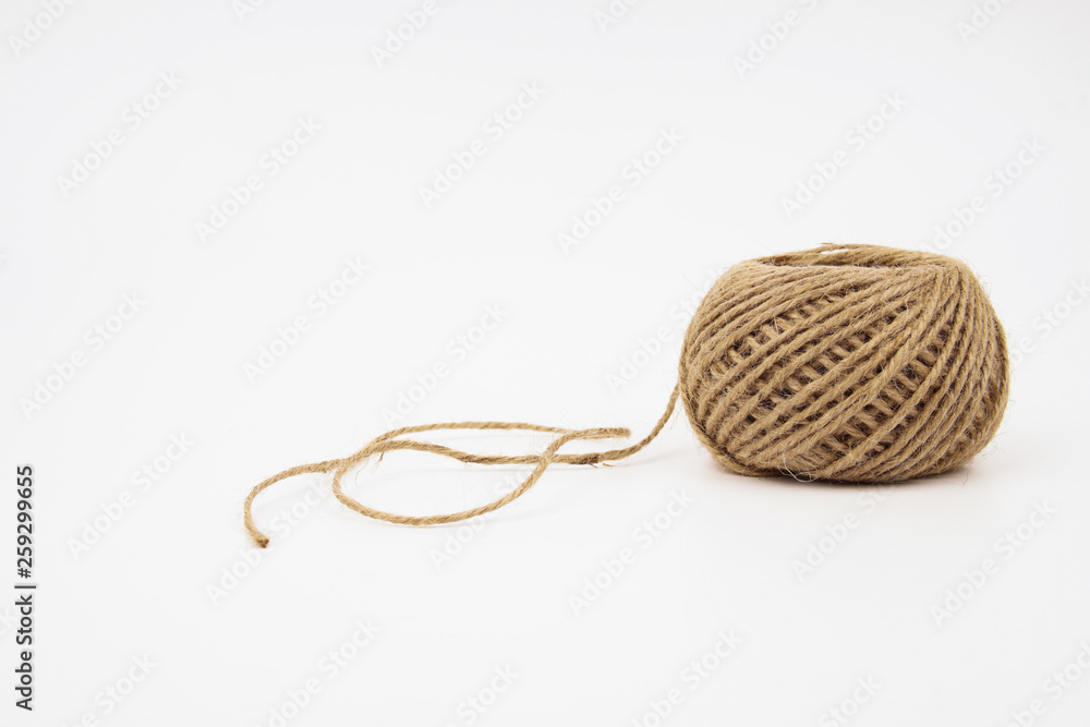 Brown rope roll isolated on white background Brown rope roll isolated on white background