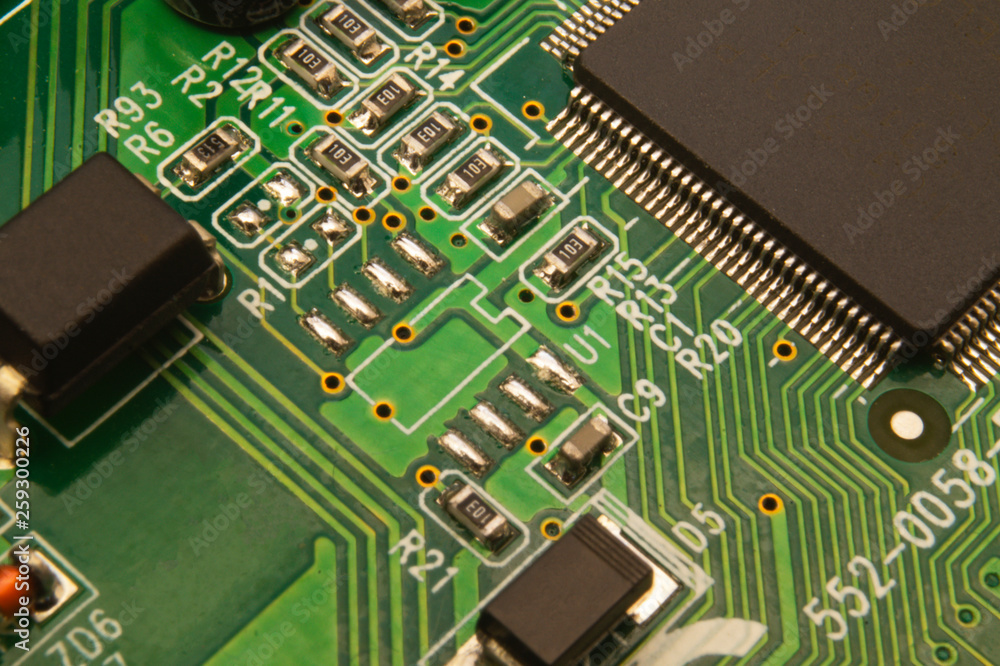 Electronic circuit board close up with different lighting. Electronic circuit board close up with different lighting.
