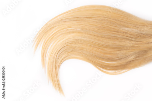 Human, natural light blond straight hair on white isolated background. An example of a fashionable hairstyle for a poster, an advertisement or a hairdressing website, packaging.