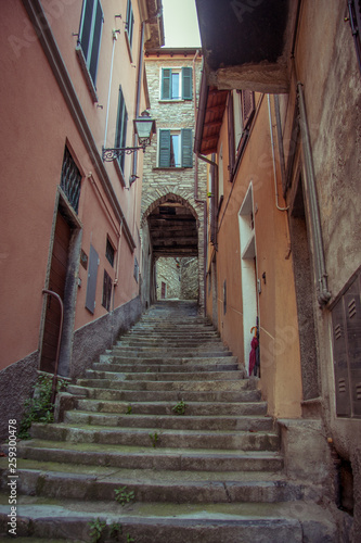 Italian narrow streets with stairs, Lake Como. Alps, Italy, Lombardi, Europe.