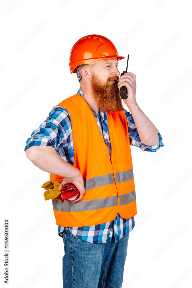 male builder  with helmet over white wall background. repair, construction, building, people and maintenance concept.