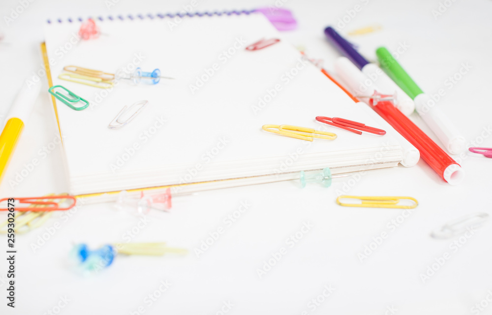 Bright stationery for study: paper, felt-tip pens, scissors, paper clips Bright stationery for study: paper, felt-tip pens, scissors, paper clips