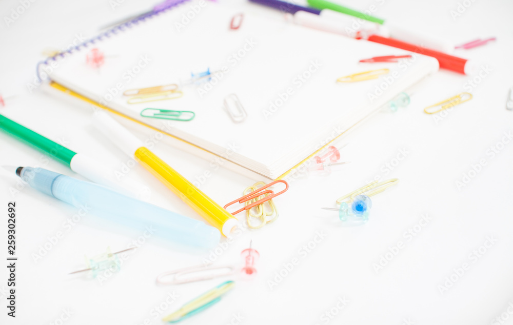 Bright stationery for study: paper, felt-tip pens, scissors, paper clips Bright stationery for study: paper, felt-tip pens, scissors, paper clips