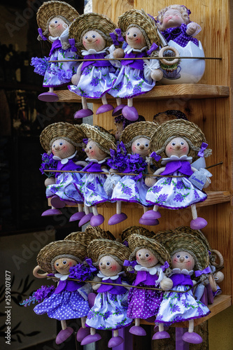 Traditional dolls in Purpe dress with Lavender Fragrance on shelves in souvenir shop in Pula, Croatia