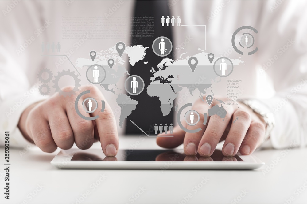 Business man in white shirt using digital tablet Business man in white shirt using digital tablet