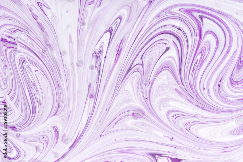Beautiful streaks of lilac paint. Empty abstract background for layouts. The process of mixing purple and white paint.