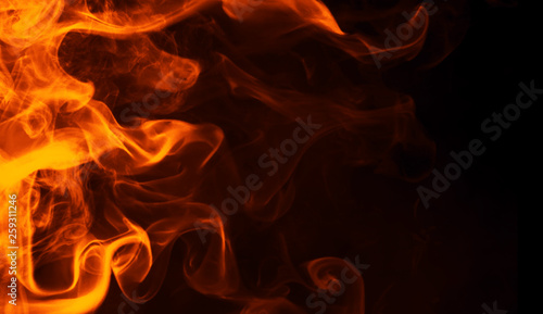 Fire flames texture on isolated black background. Perfect texture for copy space