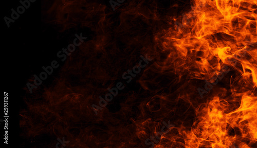 Fire flames texture on isolated black background. Perfect texture for copy space