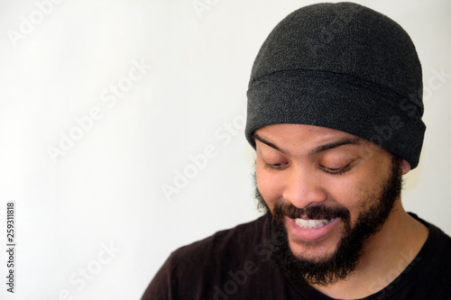 Mixed Race Man with beard close up portrait