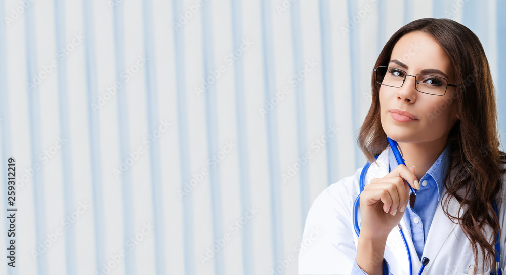 Portrait of thinking female doctor in glasses Portrait of thinking female doctor in glasses
