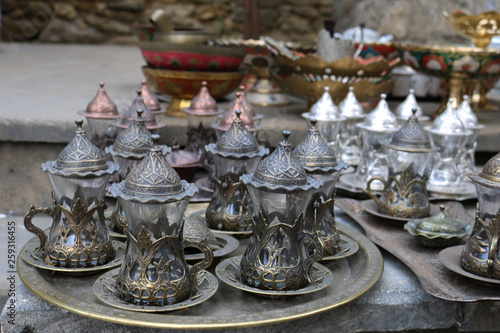  Ancient oriental tea set, Oriental souvenir. Traditional silver coffee cup set in a tray 