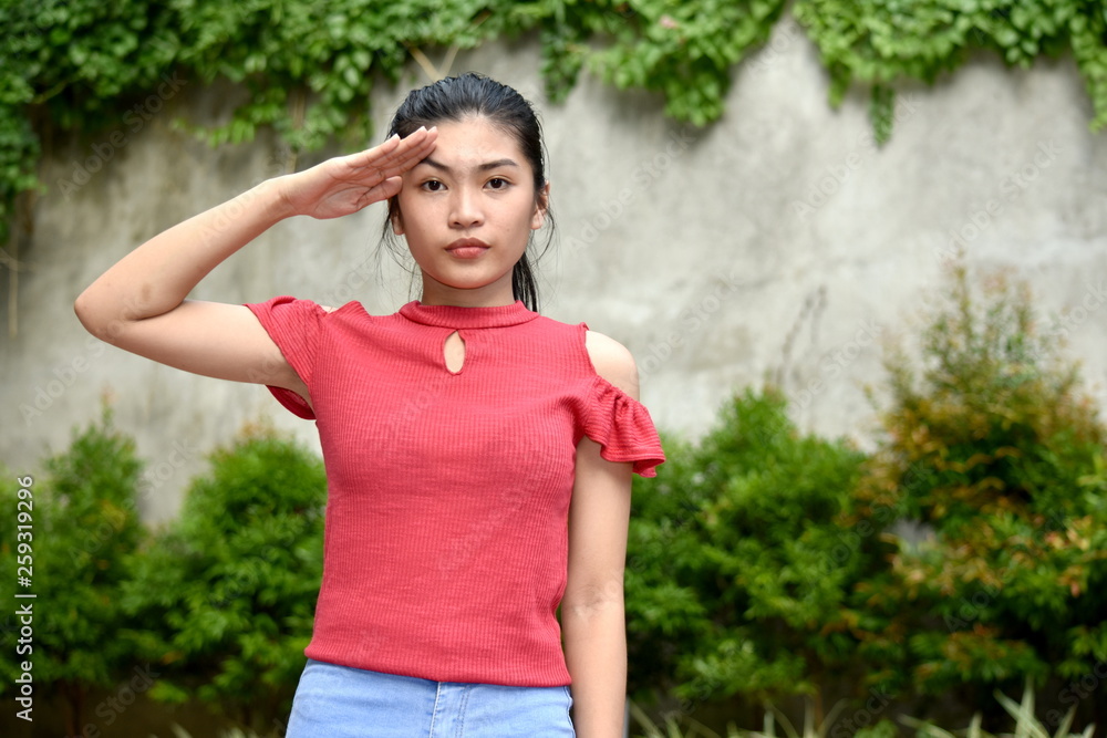 Fototapeta premium Diverse Female Youngster Saluting