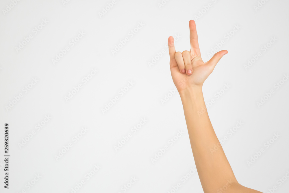 hand with index finger isolated on white background showing a rock sign hand with index finger isolated on white background showing a rock sign