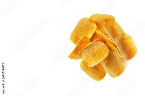 Tasty crispy potato chips on white background. Fast food snack. Copy space.
