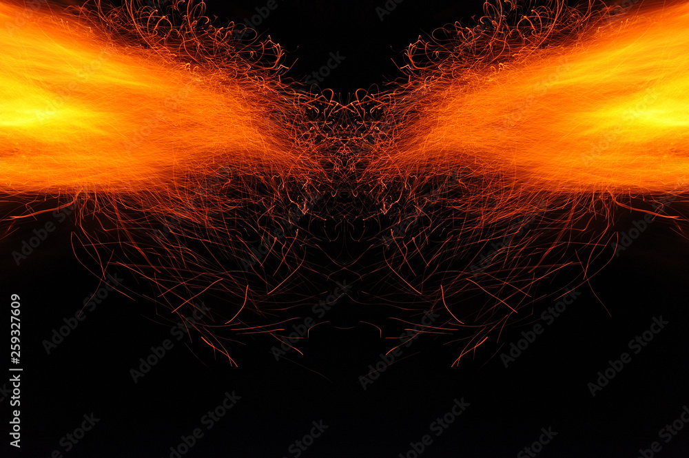 Fototapeta premium Abstraction, burning fire with sparks. Mystical prototype with patterns for the background. Horizontal reflection.