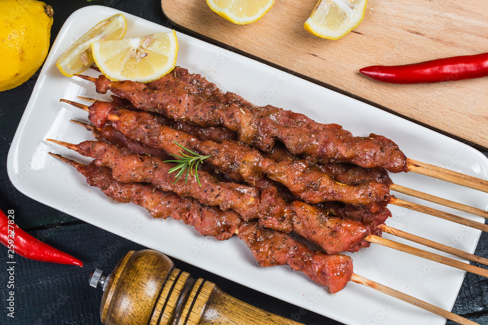 skewers shashlik kebab with red sauce skewers shashlik kebab with red sauce