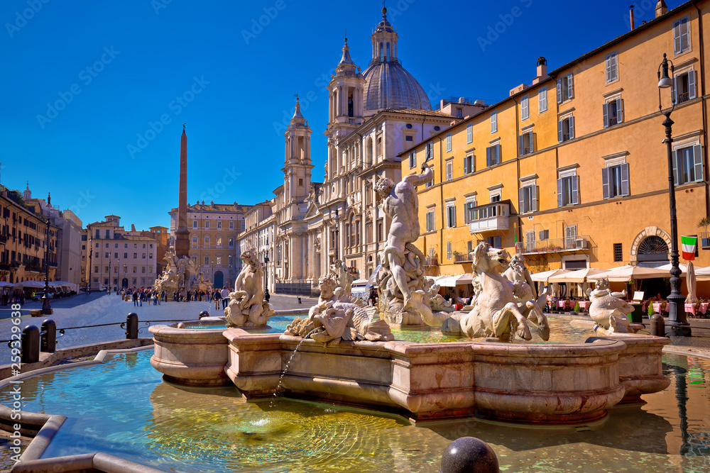 Piazza Navona square fountains and church view in Rome
