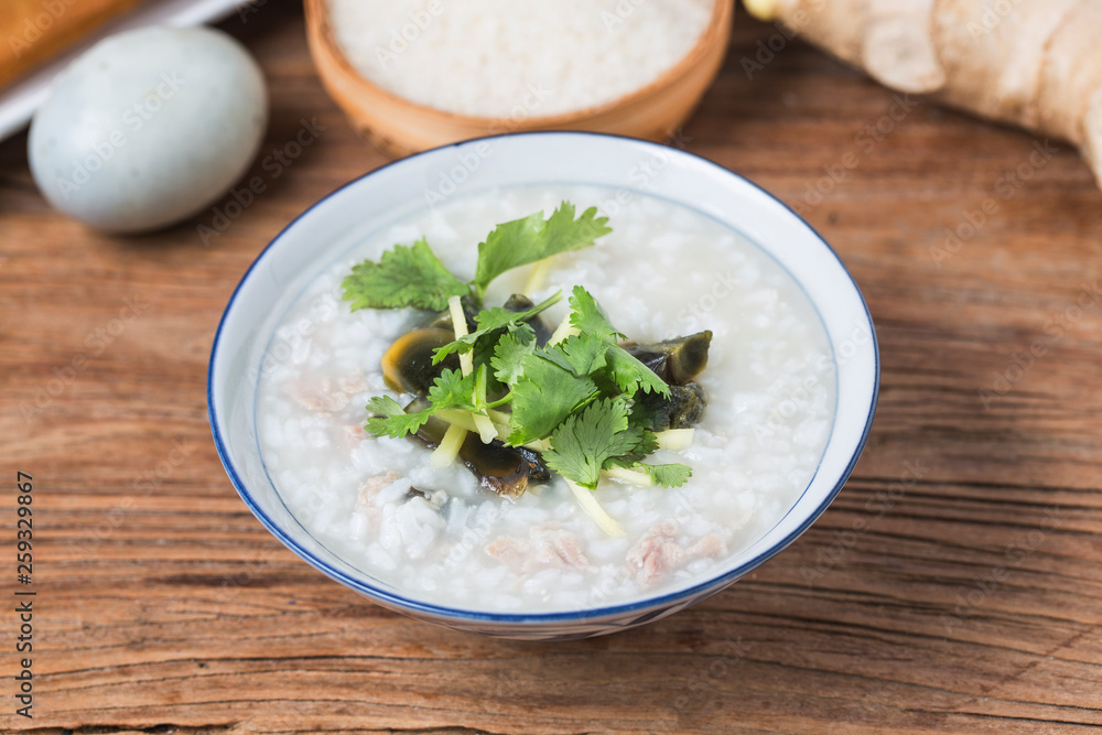 Rice preserved egg lean meat porridge，chinese rice porridge, chinese traditional healthy breakfast
