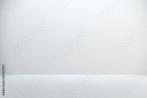 Cement wall with floor in the empty room and light for background.