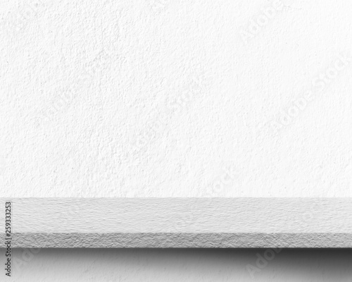 Fotografie Empty space of concrete table floor for placing advertisement products with cement wall texture background