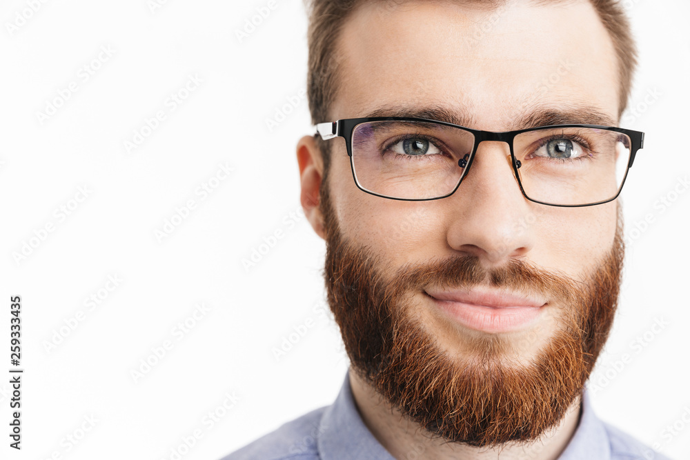 Close up image of Smiling bearded elegant man in eyeglasses Close up image of Smiling bearded elegant man in eyeglasses
