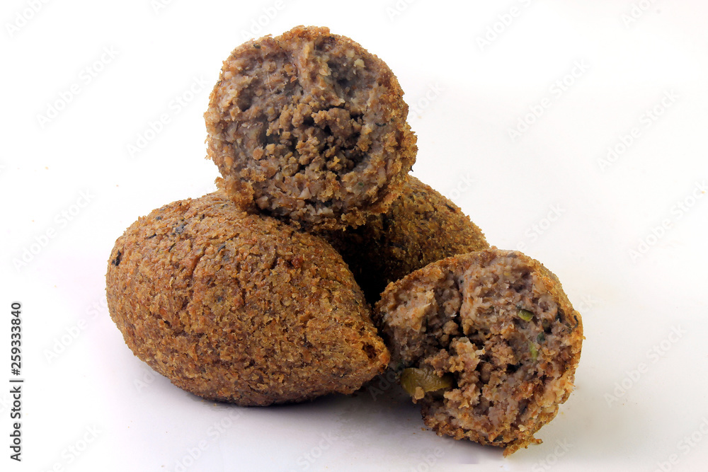 kibbeh traditional Lebanese cuisine food, isolated on white background kibbeh traditional Lebanese cuisine food, isolated on white background