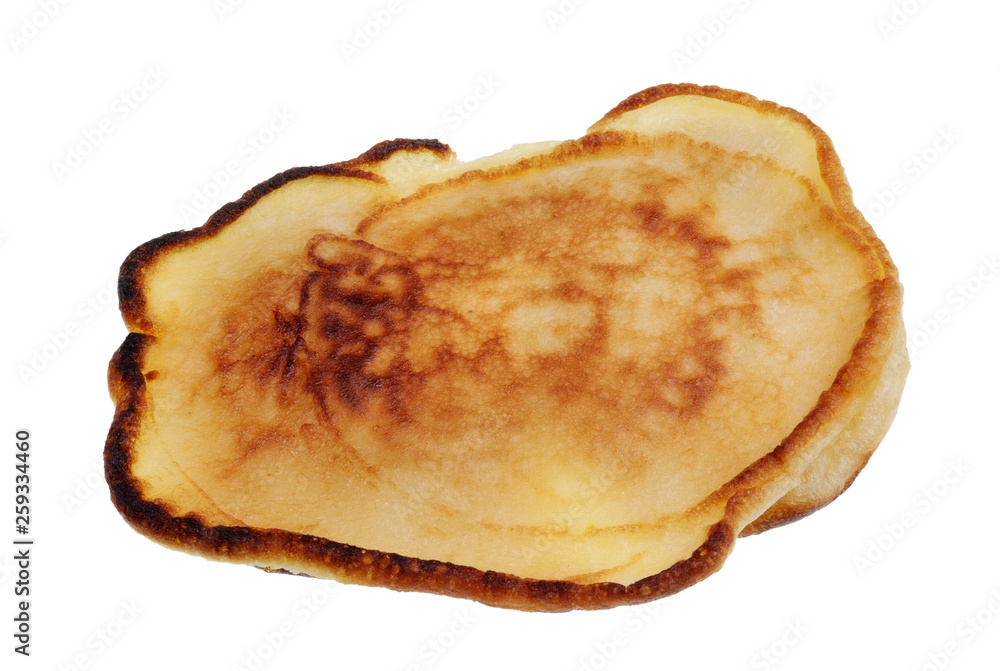 The first ugly fried pancake concept isolated on white macro The first ugly fried pancake concept isolated on white macro