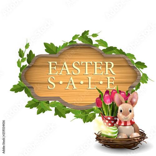 Easter sale, modern banner in form of wooden board with Easter Bunny and tulips
