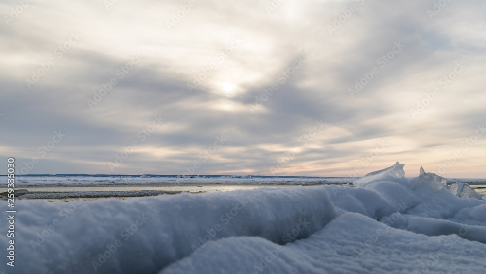 Frozen sea. Snow landscape. Sunset Frozen sea. Snow landscape. Sunset