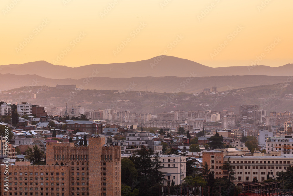 Sunset panorama view of Tbilisi, capital of Georgia country, from Narikala fortress.