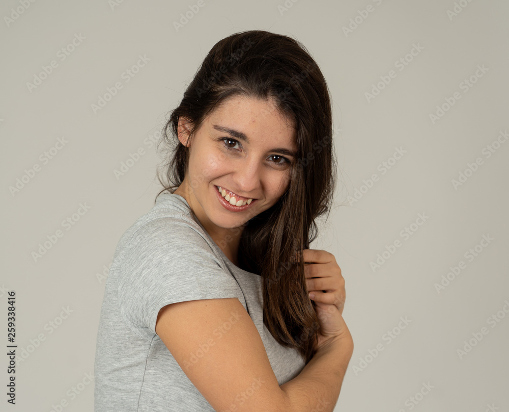 Portrait of young attractive woman with happy and smiling face. Beauty concept and lifestyle Portrait of young attractive woman with happy and smiling face. Beauty concept and lifestyle