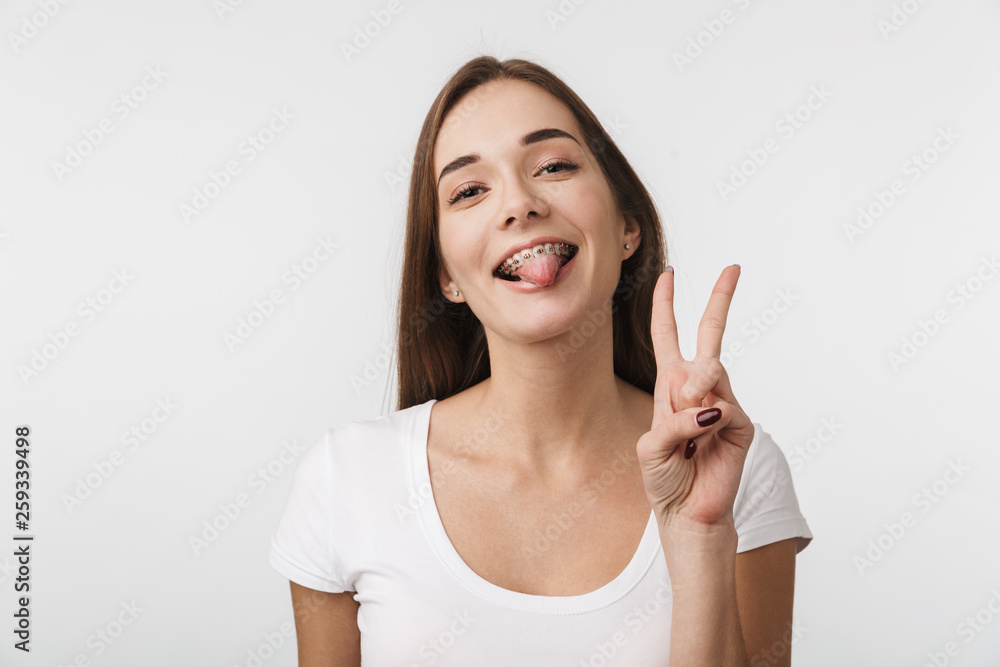 Attractive young woman standing isolated Attractive young woman standing isolated