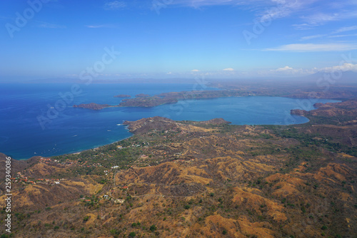 Aerial view of the Golfo del Papagayo with the Peninsula Papagayo near Liberia, Guanacaste, Costa Rica, during the dry season © eqroy