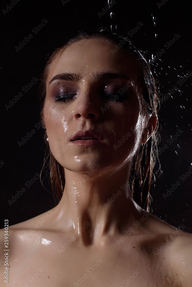 portrait of sexy wet woman face with make up and water drop portrait of sexy wet woman face with make up and water drop