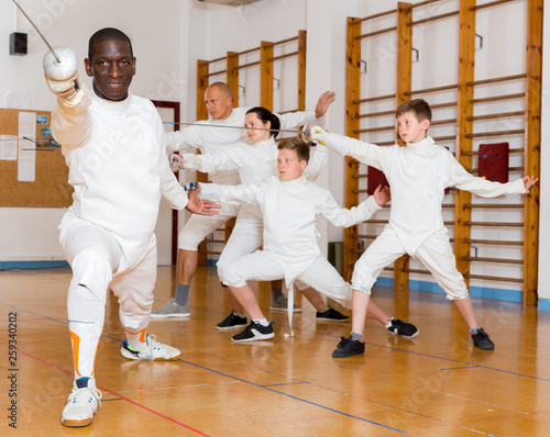 African American athlete at fencing workout