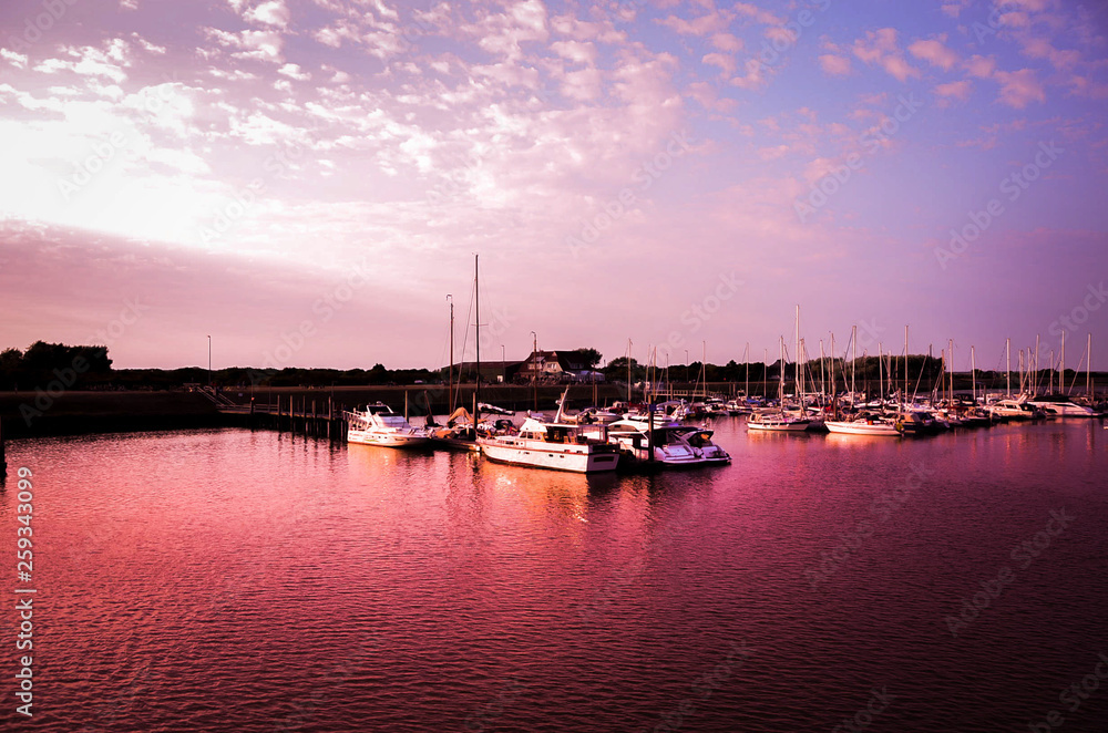 Ships in the port at sunset