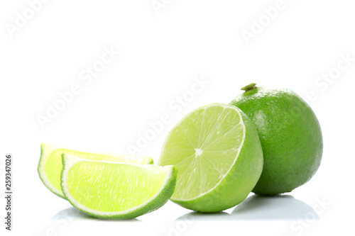 full and half lime fruit isolated on white background with copy space