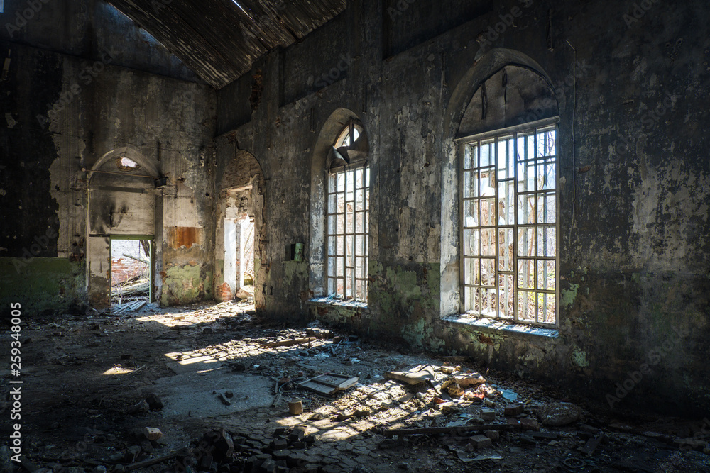 Old abandoned building with broken lancet windows inside Old abandoned building with broken lancet windows inside