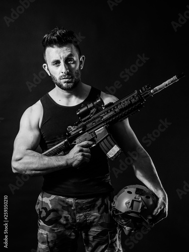 a man with a machinegun