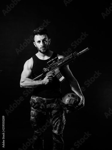 a man with a machinegun