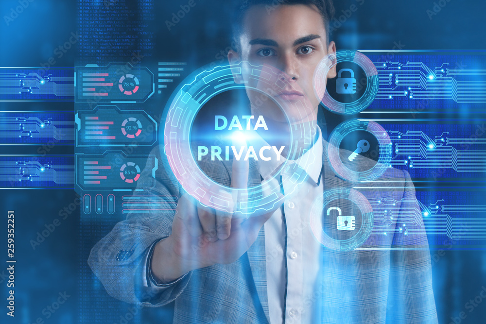 The concept of business, technology, the Internet and the network. A young entrepreneur working on a virtual screen of the future and sees the inscription: Data privacy The concept of business, technology, the Internet and the network. A young entrepreneur working on a virtual screen of the future and sees the inscription: Data privacy