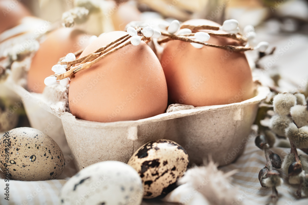 Happy Easter. Congratulatory easter background. Easter eggs and flowers. Selective focus. Happy Easter. Congratulatory easter background. Easter eggs and flowers. Selective focus.