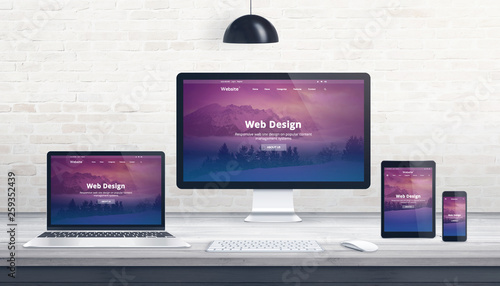 Obraz na plátne Web design, developer studio concept with responsive web page on multiple displays