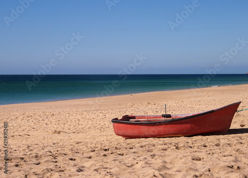 Boat on the beach © krisca
