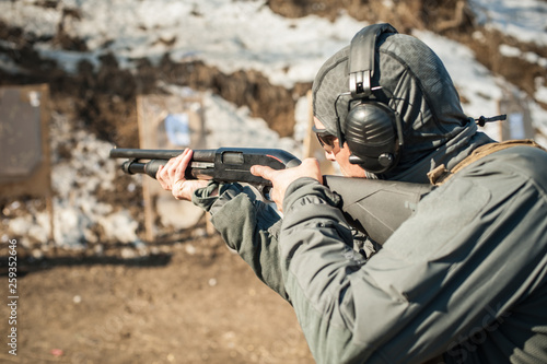 Tactical combat pump gun shooting training. Shotgun weapon action course