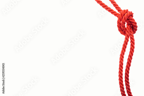 red jute ropes with sea knot isolated on white