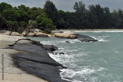 Penyabong beach or also often called Batu Lubang beach is a touristic beach at the southwestern side of Belitung Island, Indonesia photo